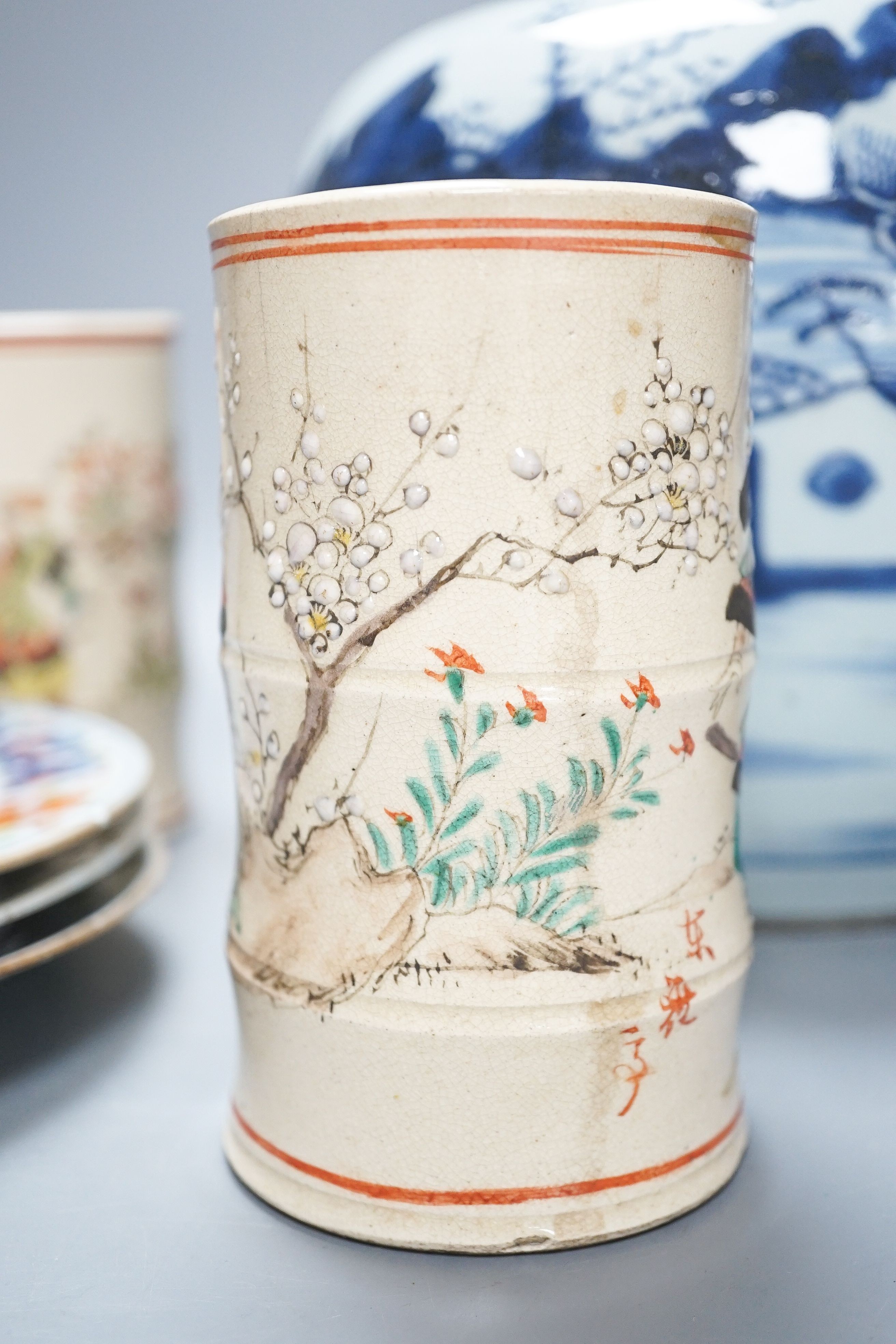 An 18th century Chinese blue and white jar, three 18th century clobbered Chinese plates and a pair of Satsuma vases
